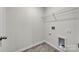 Laundry room with shelving and hardwood floors at 120 Orville Rd, Statesville, NC 28677