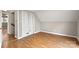This bedroom offers hardwood floors and a bright, cozy space to relax in at 1275 Rocky Creek Rd, Shelby, NC 28152