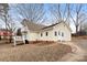 Charming two-story home featuring yellow siding, well-maintained grounds, and a private backyard at 1275 Rocky Creek Rd, Shelby, NC 28152