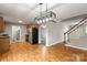 Spacious kitchen leading to stairs and living area with appliances and ample counter space at 1275 Rocky Creek Rd, Shelby, NC 28152