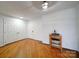 Bright living room with hardwood floors and a wine rack at 1323 Queens Rd # 424, Charlotte, NC 28207