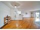 Spacious living room with hardwood floors at 1323 Queens Rd # 424, Charlotte, NC 28207