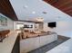 Relaxing lounge area with a large leather couch, modern lighting, and a flat screen TV at 1323 Queens Rd # 424, Charlotte, NC 28207
