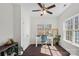 Well-lit office space with hardwood floors, large windows, and a functional layout for productivity at 15314 Logan Grove Rd, Charlotte, NC 28227
