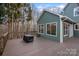 Spacious backyard deck perfect for outdoor entertainment with views of the surrounding trees at 1665 Sherwood Ct, Sherrills Ford, NC 28673