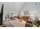 Bright living room with vaulted ceilings, fireplace, and comfortable seating arrangement at 1665 Sherwood Ct, Sherrills Ford, NC 28673