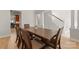 Open-concept dining area features elegant wood floors and ample space for entertaining at 18409 Harborside Dr, Cornelius, NC 28031