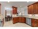 This updated kitchen boasts granite counters, stainless appliances, and a seamless flow into the dining area at 18409 Harborside Dr, Cornelius, NC 28031