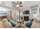 Spacious living room features a fireplace, built-in shelving and neutral decor at 18409 Harborside Dr, Cornelius, NC 28031
