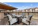 Cozy outdoor patio with lake views perfect for relaxing or entertaining at 18409 Harborside Dr, Cornelius, NC 28031