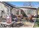 Cozy backyard patio with stylish outdoor seating, perfect for enjoying the weather and the company of friends at 19320 Davidson Concord Rd, Davidson, NC 28036