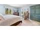 Bright bedroom with natural light, large windows, and a cozy atmosphere at 19320 Davidson Concord Rd, Davidson, NC 28036