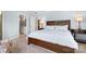Comfortable bedroom with hardwood bedframe and ensuite bathroom at 19320 Davidson Concord Rd, Davidson, NC 28036