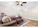 Cozy living room featuring comfortable seating and natural light at 19320 Davidson Concord Rd, Davidson, NC 28036