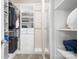 Organized walk-in closet featuring shelving and drawers offers ample storage at 19320 Davidson Concord Rd, Davidson, NC 28036