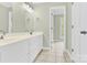 Well-lit bathroom featuring a dual sink vanity with generous counter space at 2041 Jefferson Ave, Gastonia, NC 28056