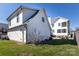 The home's backyard with healthy green grass and home exterior at 2526 Fort St, Charlotte, NC 28205