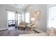 Cozy balcony seating area, accessed from the sitting room, is the perfect private retreat for relaxation at 2526 Fort St, Charlotte, NC 28205