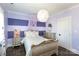 Charming bedroom features whimsical decor, stylish furniture, and ample natural light at 2526 Fort St, Charlotte, NC 28205