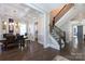 Dining room adjacent to staircase with sleek floors and natural light at 2526 Fort St, Charlotte, NC 28205