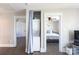 Hallway showing stacked washer/dryer, access to a bedroom and a view of the home's interior at 2526 Fort St, Charlotte, NC 28205