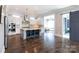 Spacious kitchen with a center island, modern appliances, a breakfast bar and a view to the sunroom at 2526 Fort St, Charlotte, NC 28205