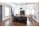 Inviting living room boasting a fireplace, coffered ceiling, natural light and contemporary decor at 2526 Fort St, Charlotte, NC 28205