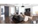 Comfortable living room featuring a fireplace, coffered ceiling, stylish furniture and a sliding barn door at 2526 Fort St, Charlotte, NC 28205