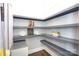 Neatly organized pantry with ample shelving and storage space for all your kitchen essentials at 2526 Fort St, Charlotte, NC 28205
