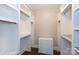 Walk-in closet features custom shelving and storage solutions, providing plenty of space for organization at 2526 Fort St, Charlotte, NC 28205