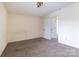 Neutral bedroom with carpet, and closet, creating a simple space ready for personalization at 281 S Herlong Ave # Apt E, Rock Hill, SC 29732