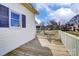 A spacious deck with a white railing, seating, and a view of the outdoors at 305 S Clay St, Gastonia, NC 28052