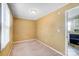 Cozy bedroom with carpeted floors, light fixture, and a window, offering a warm and inviting atmosphere at 305 S Clay St, Gastonia, NC 28052