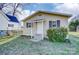 Charming home with vinyl siding, blue shutters, and a manicured lawn at 305 S Clay St, Gastonia, NC 28052
