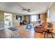 Bright living room featuring hardwood floors, ceiling fan and comfortable seating at 305 S Clay St, Gastonia, NC 28052