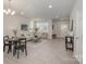 Sunlit living room featuring sleek floors, an open layout, and stylish furnishings for comfortable living at 330 Malvern Sw Ave # B, Concord, NC 28025