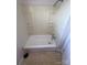 Compact bathroom featuring a tub and shower combo with built-in shelving at 3412 1St Avenue Nw Cir, Hickory, NC 28601