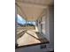 View of covered front porch supported by columns, with the home's address visible at 3412 1St Avenue Nw Cir, Hickory, NC 28601