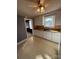 Cozy eat-in kitchen featuring a double sink, wood counters, and ample cabinet space at 3412 1St Avenue Nw Cir, Hickory, NC 28601