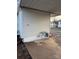 The covered patio features a concrete base and chairs, offering a relaxing outdoor space at 3412 1St Avenue Nw Cir, Hickory, NC 28601
