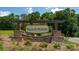 Elegant community entrance sign 'Falls at Hickory' with stone accents and lush landscaping at 3708 13Th Ne St, Hickory, NC 28601