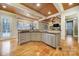 Spacious kitchen with stainless steel appliances, granite countertops, and hardwood floors at 411 Belo Ct, Fort Mill, SC 29715