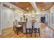 Modern kitchen island with seating, stainless steel appliances, and custom cabinetry at 411 Belo Ct, Fort Mill, SC 29715