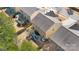 Aerial view of a private backyard featuring a patio with outdoor seating and a charming landscaped area at 4462 Haddington Dr, Fort Mill, SC 29707
