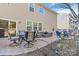 Wide angle shot of backyard patio with outdoor seating and dining at 4462 Haddington Dr, Fort Mill, SC 29707