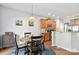 Cozy dining area adjacent to the kitchen with a modern chandelier at 4462 Haddington Dr, Fort Mill, SC 29707