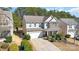 Charming two-story home with a well-manicured lawn and inviting curb appeal at 4462 Haddington Dr, Fort Mill, SC 29707