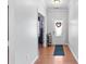 Inviting hallway entrance with hardwood floors, leading to an office space at 4462 Haddington Dr, Fort Mill, SC 29707
