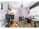 Charming office space with hardwood floors, a black and white rug, and modern decor at 4462 Haddington Dr, Fort Mill, SC 29707