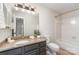 Bathroom featuring a decorative granite countertop with a tub at 5011 Sharon Rd # B, Charlotte, NC 28210